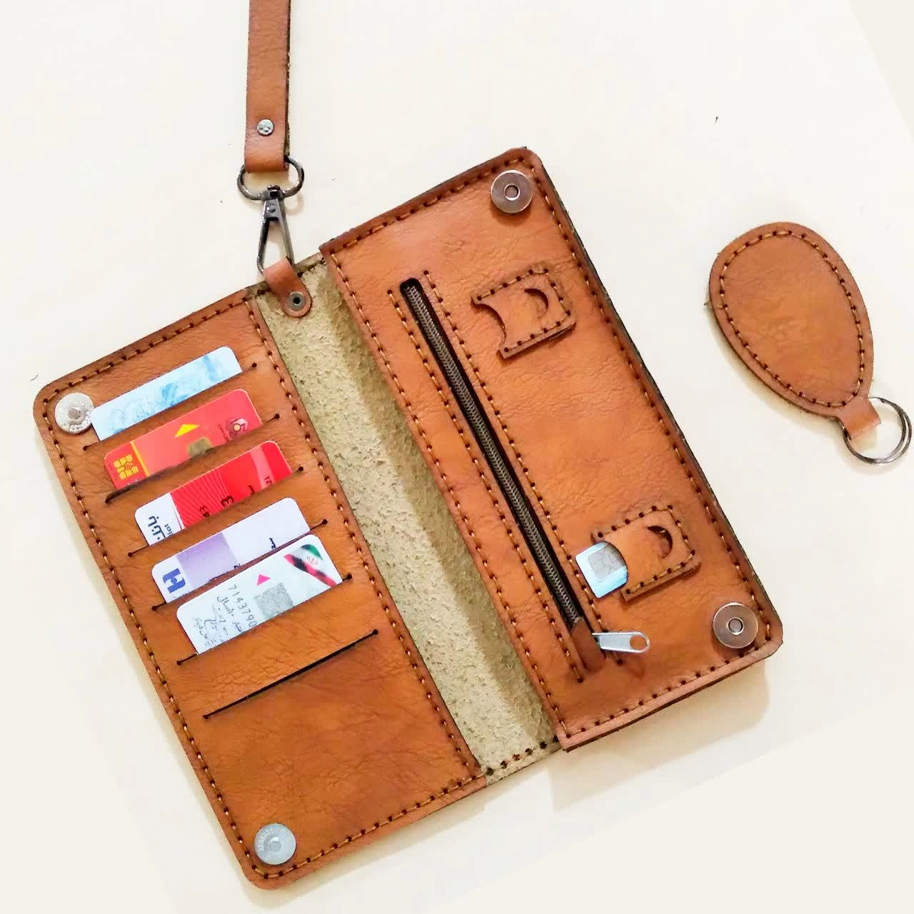 کیف پول وموبایل چند کاره مدل کیهان چرم خارجی درجه یک