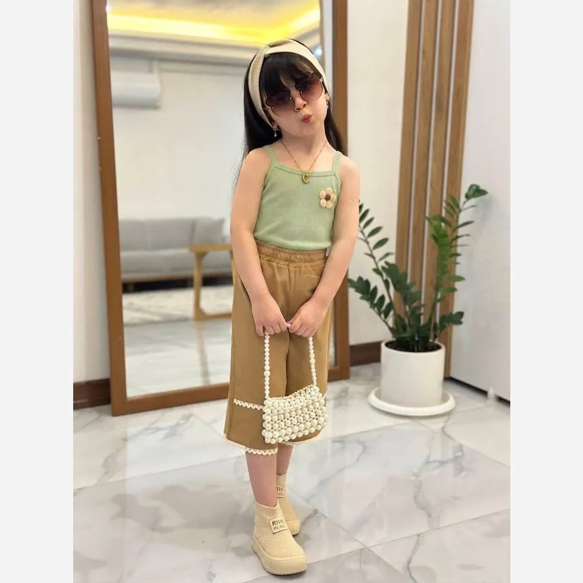 ست تاپ و شلوارک دخترانه مدل گلبرگ جنس فانریپ و لینن مناسب 2 تا 9 سال
