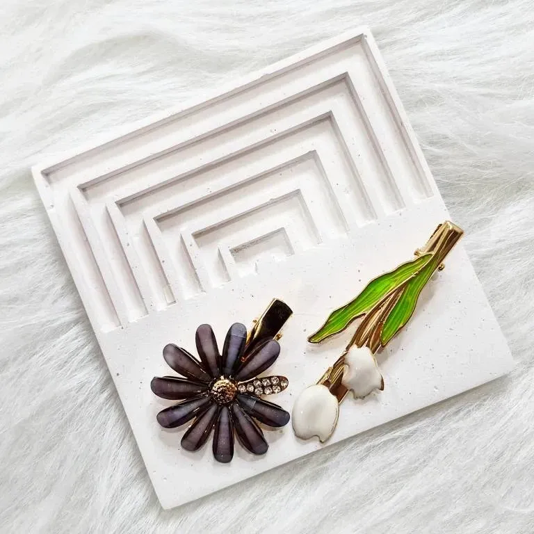 گیره مو وارداتی طرح بابونه و لاله بسته 2 عددی