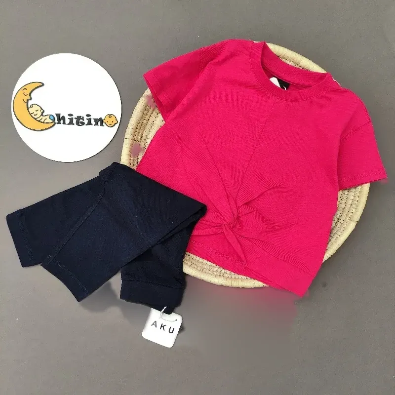تیشرت کراپ گره ای آکو برای کودکان 2 تا 9 سال در رنگهای سرخابی و کرم